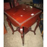 Edwardian mahogany drop leaf square occasional table on moulded cabriole legs with under shelf.