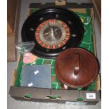 A roulette board with chips, counters and mat. (B.P. 21% + VAT)