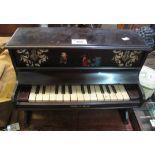 Early 20th century mini piano with painted decoration. 38 cm wide approx. (B.P. 21% + VAT)