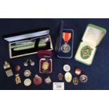 Queen Elizabeth II Fire Brigade Long Service and Good Conduct medal, assorted pin badges, cuff