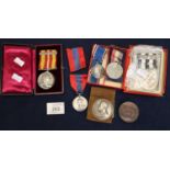 Assorted medals and medallions to include The Carmarthenshire Agricultural Society medallion, a