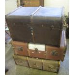 Three similar cane bound steamer trunks. (B.P. 24% incl. VAT)