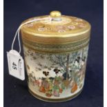 Good quality Japanese Satsuma cylinder jar and cover, decorated with panel of figures in a garden