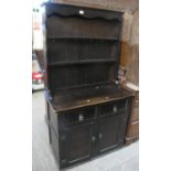 Small early 20th century oak dresser with boarded two shelf back, over two drawers and two blind