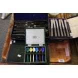 Tray comprising a cased carving set, cased cutlery, set of six enamelled coloured spoons etc. (B.