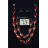Silver and red enamel necklace, bracelet and earrings. (B.P. 21% + VAT)