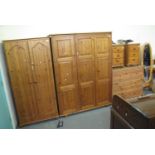 Collection of pine bedroom furniture to include; double wardrobe, triple wardrobe, pair of three