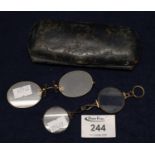 Pair of Pinz-nez oval spectacles and a pair of hinged lorgnettes type spectacles in a case. (B.P.