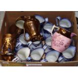 Box of assorted floral dresser jugs, copper lustre dresser jugs, pink lustre baluster jug etc. (B.P.