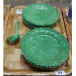 Set of 11 19th Century green leaf moulded cabinet plates, together with a matching ladle. (B.P.