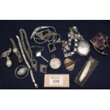 Collection of silver and costume jewellery including a Victorian style white metal locket and chain.