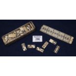 Cased bone domino set overall carved, possibly 19th Century Prisoners of War. (B.P. 21% + VAT)