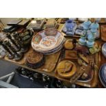 A tray of Kashmir carved wooden and painted candlesticks and bowls, together with a tray of oddments