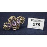 Victorian yellow metal three stone amethyst brooch. (B.P. 21% + VAT)