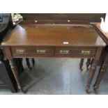 Edwardian mahogany side table, having moulded top above two pull out drawers on ring turned supports