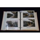 Album of 225 photos of modern trains and stations, all postcard sized, in maroon album.