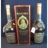 Two similar bottles of Martell VS fine cognac, both 1L and 40% volume. Together with a Martell '