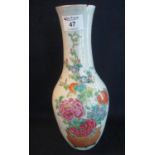 Japanese stoneware porcelain baluster bottle vase with slightly flared neck, enamel decorated with a