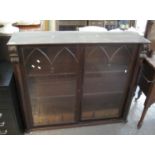 Victorian mahogany chiffonier two door glazed bookcase with sliding doors and fitted drawers with