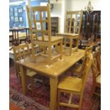 Large modern beech kitchen table of rectangular form with square chamfered legs together with a