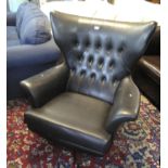 1970's leather finish button back upholstered office swivel armchair. (B.P. 21% + VAT)