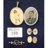 Victorian silver engraved locket, pair of cufflinks and a heary bar brooch set with a sapphire. (B.
