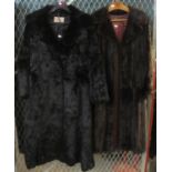 Two long black or dark brown vintage fur coats, one rabbit fur by Canopy and the other mink by