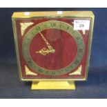 Imhof eight day Swiss mantel clock of square form on a gilt base, having gilt foliate mounts. Height