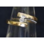 14ct two colour gold and diamond crossover style ring. Ring size K. Weight 3.9 grams approx. (B.P.