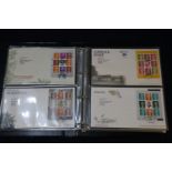 Great Britain stamp collection of Prestige multi value panes on First Day Covers, 1990 to 2019, in