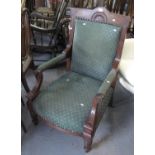Edwardian mahogany upholstered parlour type open armchair with padded arms on turned feet. (B.P. 21%