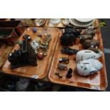 Two trays comprising mainly novelty elephants, some in the form of piggy banks, hardstone and