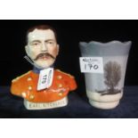 Mocha ware type pottery tumbler, together with a ceramic bust of Earl Kitchener. (2) (B.P. 21% +