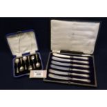 Cased set of silver handled dessert knives with steel blades in original Selfridge & Co case,