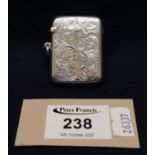 Silver foliate engraved vesta case, Birmingham hallmarks. 0.8 troy ozs approx. (B.P. 21% + VAT)