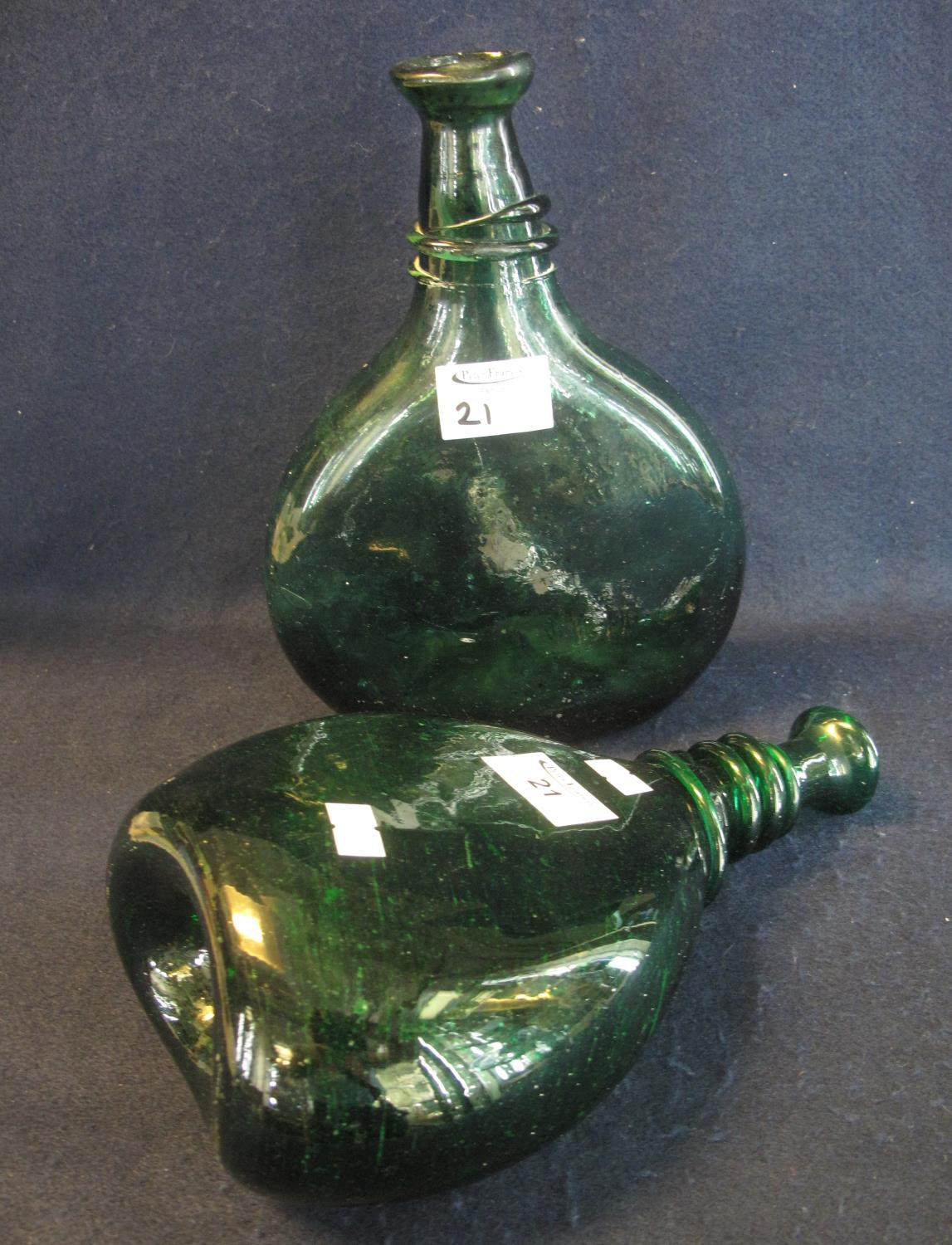 Two similar green glass soda type flasks. (2) (B.P. 21% + VAT)
