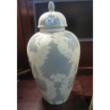 Modern china baluster shaped jar and cover with trailing foliage decoration. (B.P. 21% + VAT)