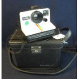 Polaroid 1000 land camera in original fitted carrying case. (B.P. 21% + VAT)