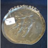 Art Nouveau pewter dish of circular form decorated with cherubs and roses, impressed to the back