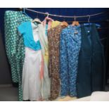 Collection of vintage clothing (50's-70's) to include; two patterned shirt dresses or house coats, a