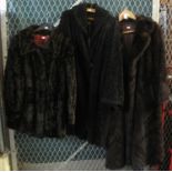 A vintage faux fur jacket, an astrakhan swing coat and a dark brown mink tail fur vintage coat. (