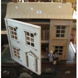 Modern plywood doll's house, the interior revealing furniture and accessories etc. (B.P. 21% + VAT)