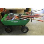 'The Handy' garden trolley on wheels, together with various garden tools, racks, shears etc. (B.P.