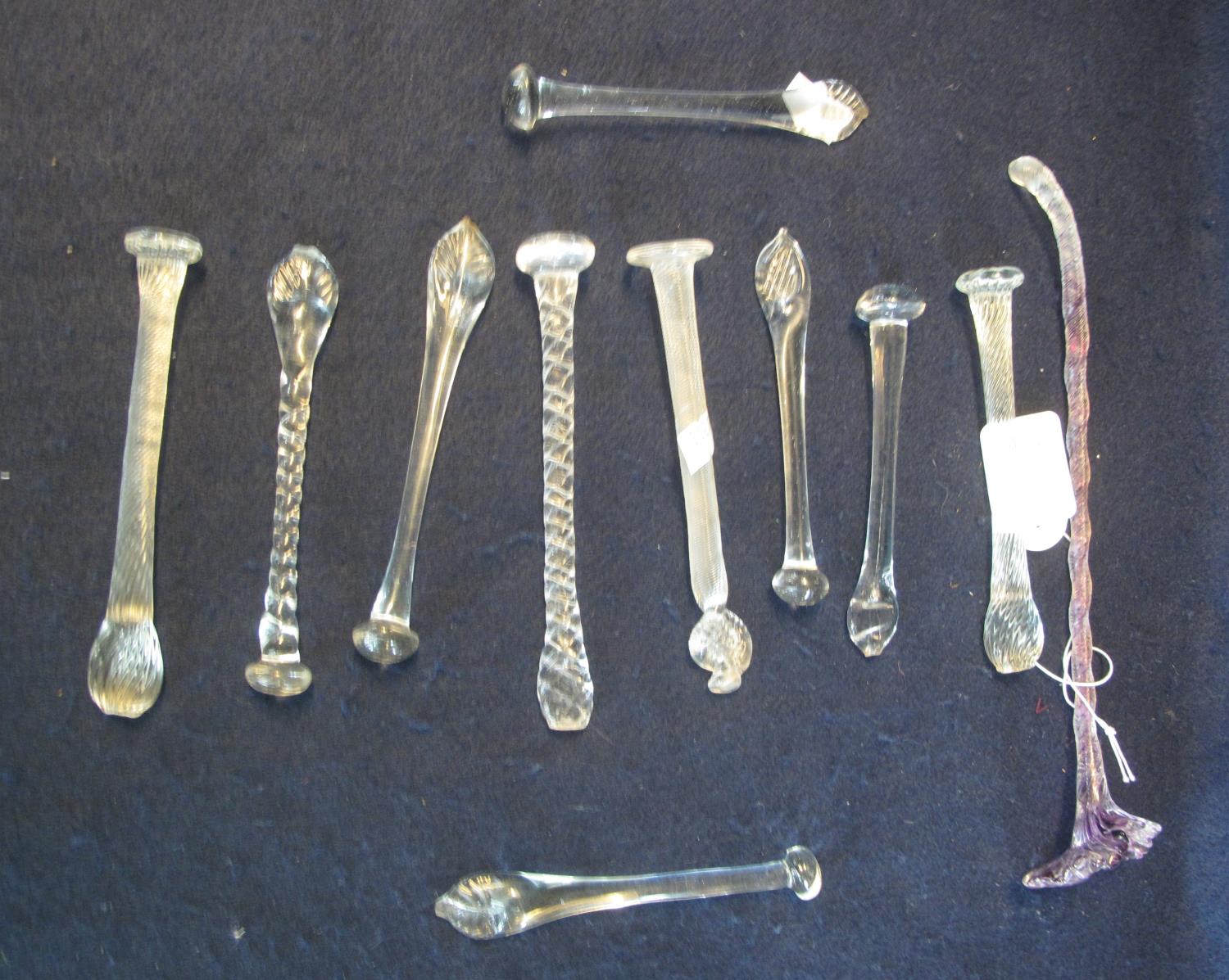 Collection of mainly clear glass stirrers of varying designs. (11) (B.P. 21% + VAT)