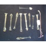 Collection of mainly clear glass stirrers of varying designs. (11) (B.P. 21% + VAT)