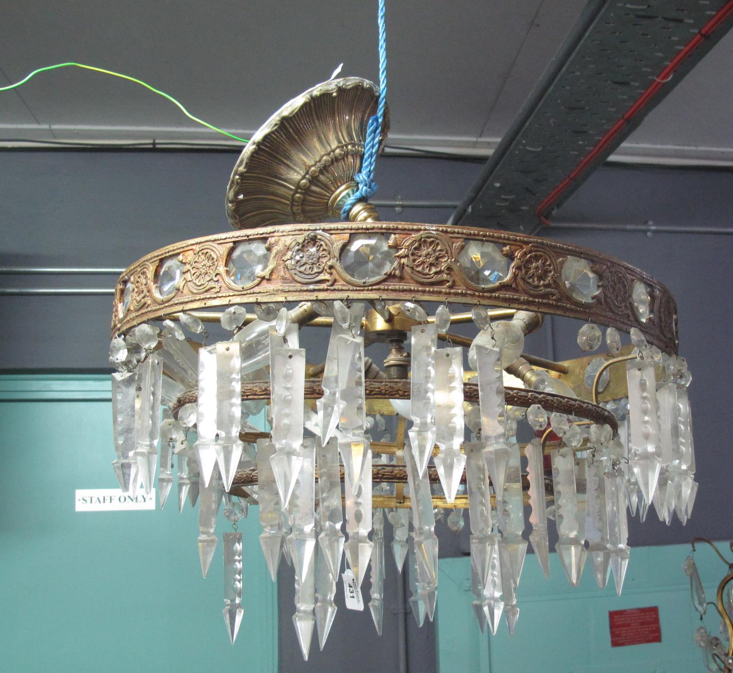 Circular gilt metal Art Deco style, three tier centre light fitting with prismatic glass spangles