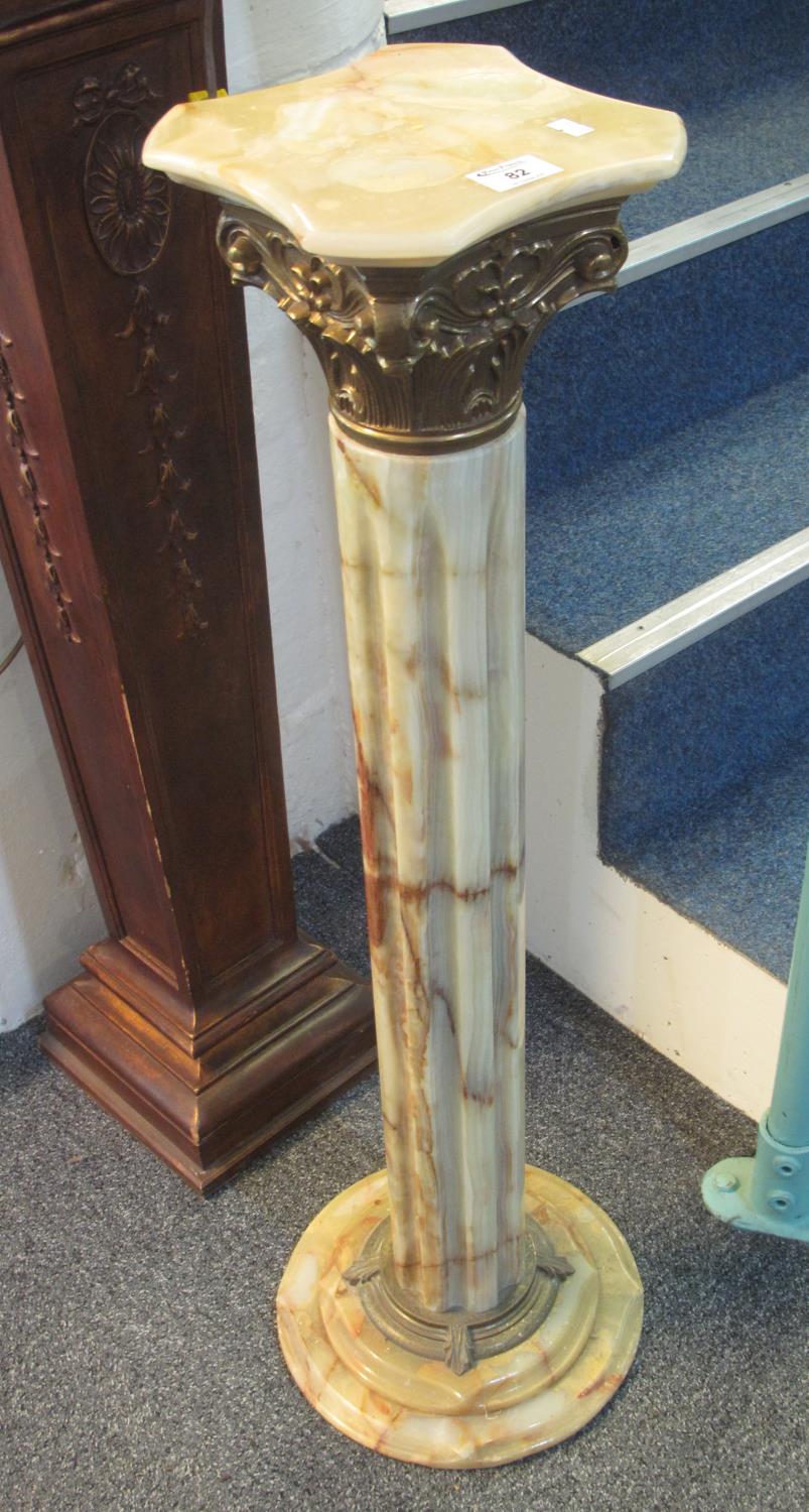 Onyx Corinthian column design torchere stand with gilded mounts. 92cm high approx. (B.P. 21% +