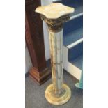 Onyx Corinthian column design torchere stand with gilded mounts. 92cm high approx. (B.P. 21% +