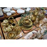 Three trays of mainly Middle Eastern brass items to include; vases, table gong in the form of a