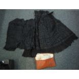 Box of antique clothing and accessories to include: a long black Victorian skirt, a black